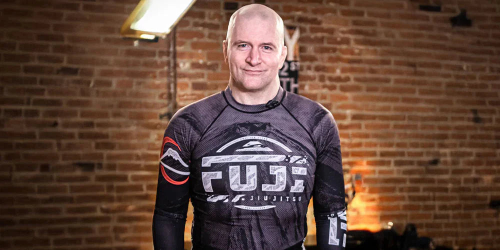 O femeie povesteste despre o intalnire cu John Danaher: „A purtat, intr-adevar, un rashguard”