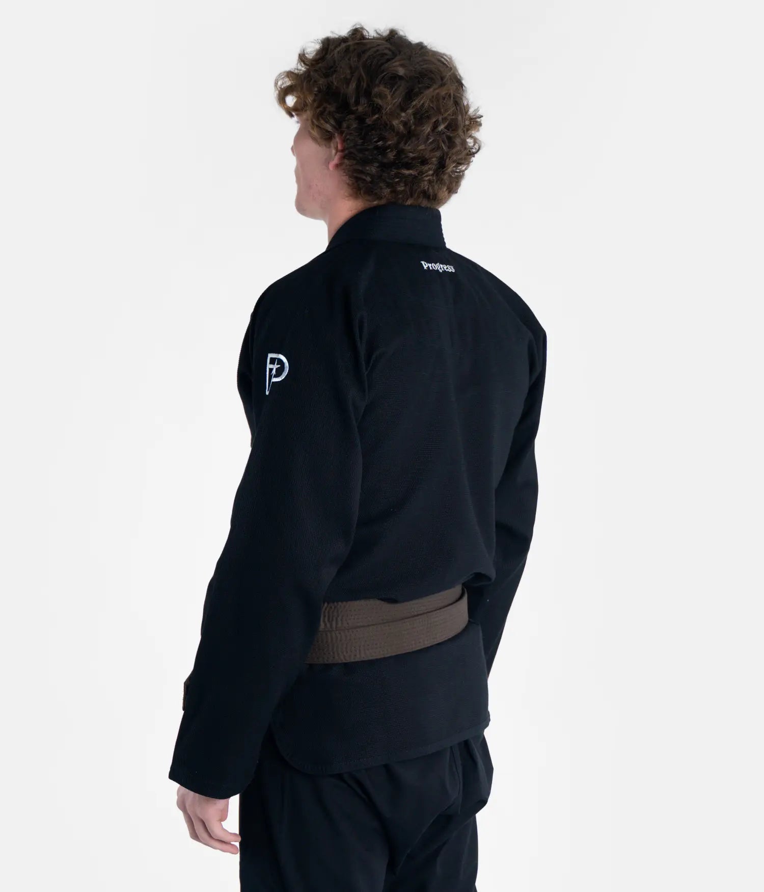 Kimono Brazilian Jiu Jitsu PROGRESS Negru poza facuta pe un model din partea stanga-spate